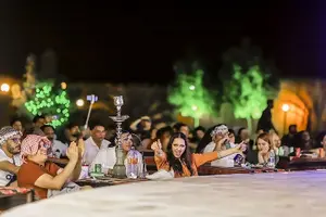Tour image of Dubai Evening Desert Safari With Transfers Dune Bashing & Dinner