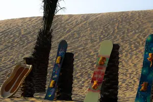 Tour image of Abu Dhabi Desert Safari (Dune Bashing, BBQ Dinner, Camel Ride & Sand Skii)