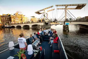Tour image of Amsterdam Canal Cruise With Live Guide and Unlimited Drinks
