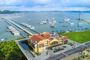 Tour image of Halong bay 4 hours boat tour from Halong city with 2 caves, kayak