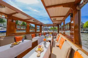Tour image of Amsterdam Classic Saloon Boat Cruise with Drinks and Cheese
