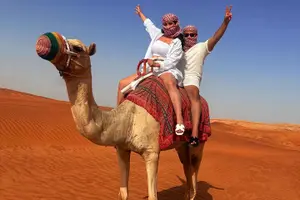 Tour image of Dubai: Red Dunes, Sandsurf, Camel Ride, BBQ Dinner at Desert Camp