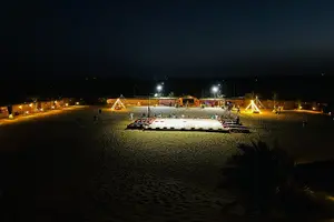 Tour image of Abu Dhabi: Evening Desert Safari with Camel Ride, BBQ & Live Show