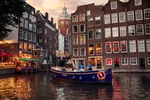 Tour image of Amsterdam: Canal Booze Cruise with Unlimited Drinks Option